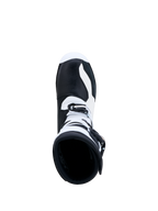 Alpinestars Tech-T Stiefel, Trial-Motorradstiefel in Schwarz und Weiß, Draufsicht, Lederkonstruktion und Schnallenverschluss.