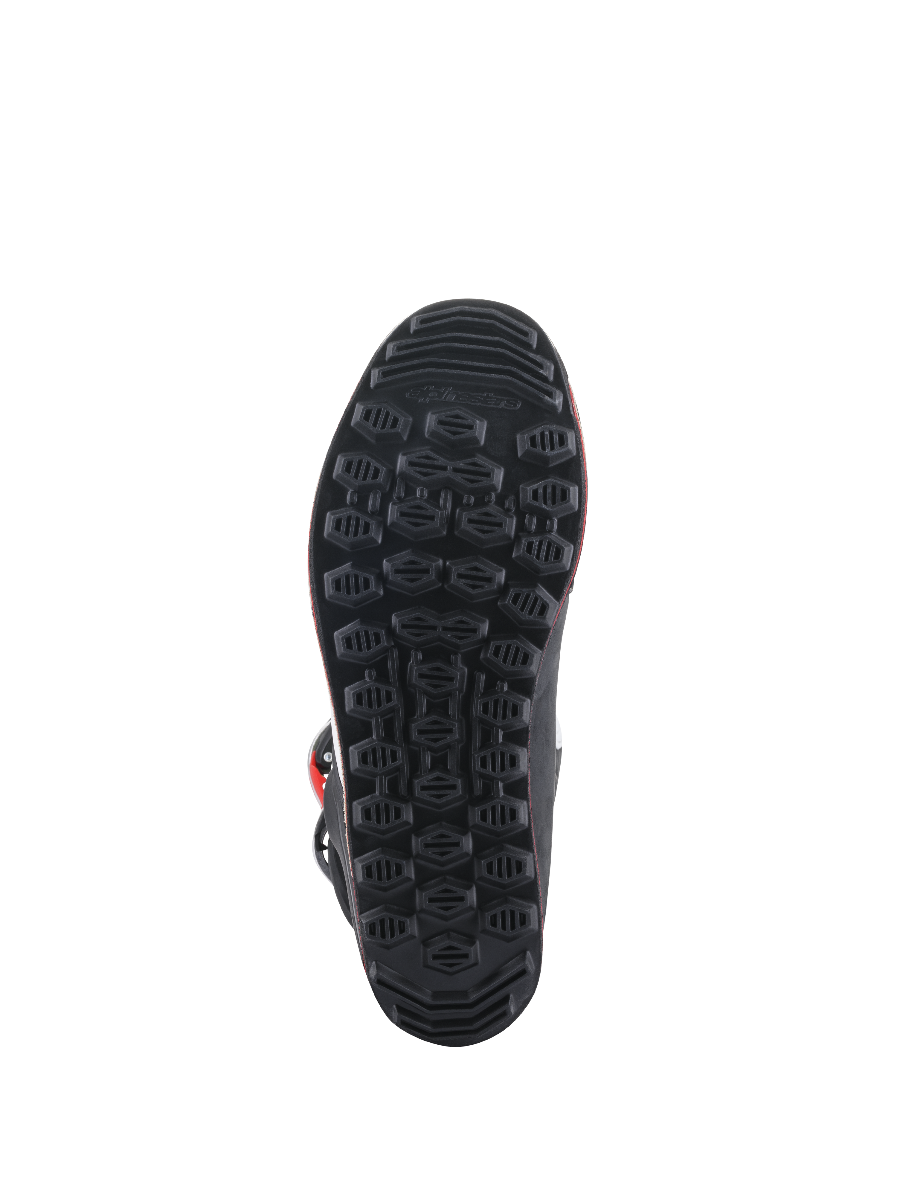 Alpinestars Tech-T Stiefel, Sohlenansicht, schwarze Gummiaußensohle mit strukturiertem hexagonalem Grip-Muster, entwickelt für Sensibilität beim Trial-Fahren und Kontrolle auf den Fußrasten.