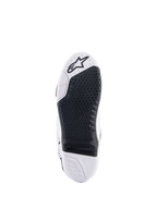 Alpinestars Tech 10 Stiefel, Motocross-Stiefel, Unteransicht mit schwarzem austauschbarem Mitteleinsatz und weißer Sohle, strukturiertes Profilmuster, Alpinestars-Sternlogo im Zehenbereich, strapazierfähiges Offroad-Schuhwerk