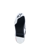 Alpinestars Tech-10 Stiefel, Motocross-Sohle in Schwarz und Weiß mit austauschbarem Gripeinsatz und Sternlogo.