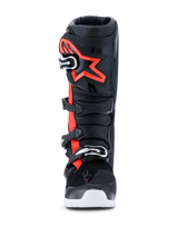 Alpinestars 2026 Tech 7 Enduro Drystar® Boots, Motocross and Enduro Boots, Black Red Fluo and White, front view, featuring a four-buckle closure system, reinforced TPU shin plate with a large red Alpinestars logo, and white outsole, engineered for waterproof off-road performance.