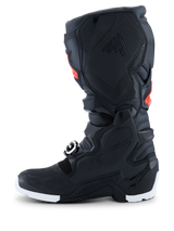 Alpinestars 2026 Tech 7 Enduro Drystar® Boots, Enduro Motocross Boots, Black with Red Fluo and White accents, side profile view highlighting the TPU honeycomb medial grip panel and white sole, durable waterproof construction for off-road performance