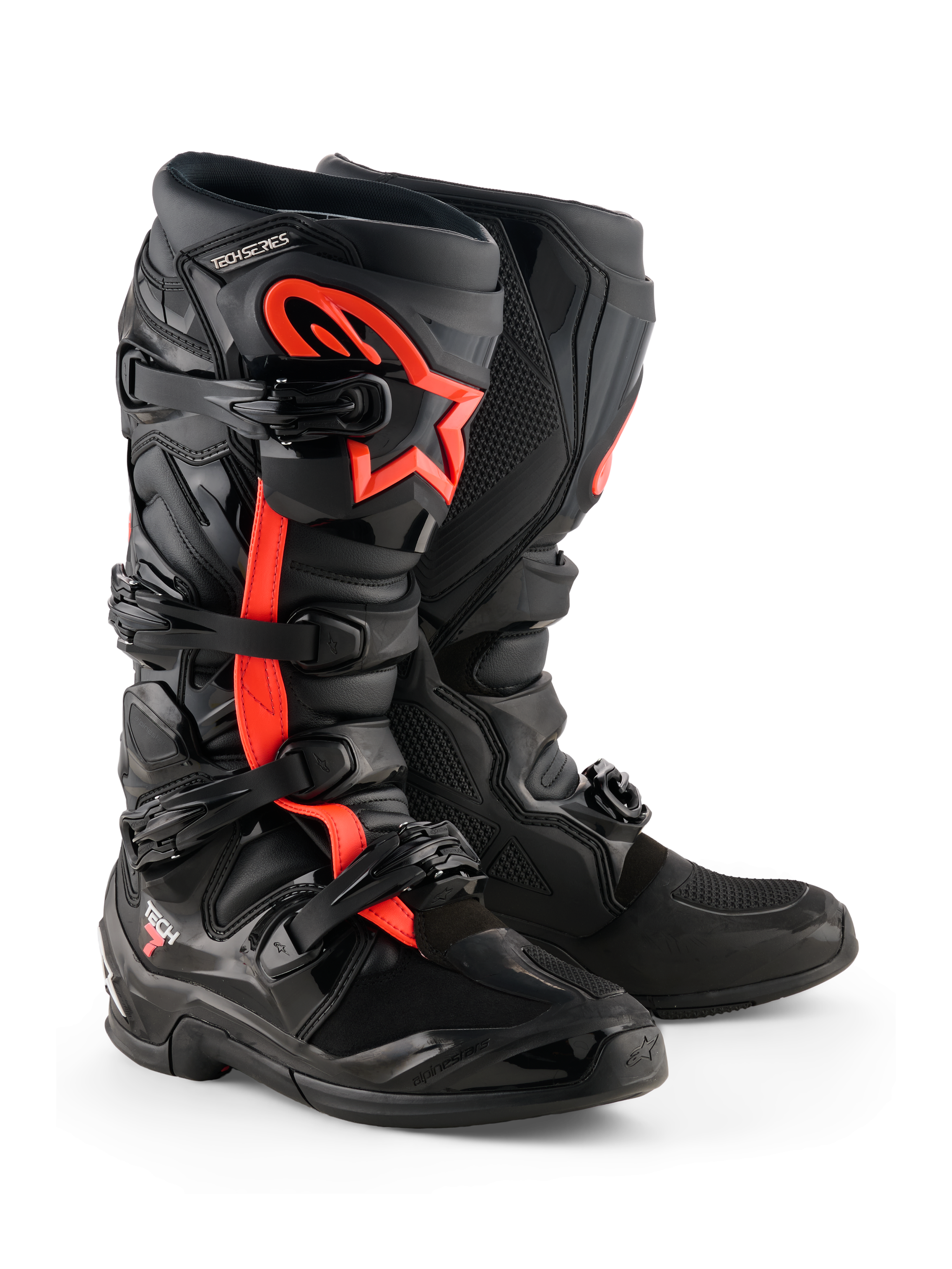 Alpinestars Tech 7 Stiefel, Motocross-Stiefel, Schwarz und Rot Fluo, mit vier schwarzen Schnallen, TPU-Schienbeinplatte und rotem Alpinestars-Sternlogo an der Seite, robustes Offroad-Design.