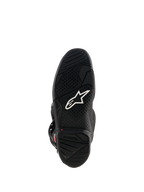 Alpinestars Tech 7 Stiefel, Ansicht der schwarzen Gummisohle, mit weißem Astar-Logo, strukturiertem Profil und roter Verschleißgrenzen-Anzeige für Motocross-Performance.