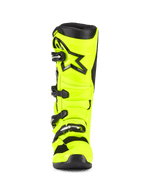 Alpinestars Tech 7 Stiefel, Motocross-Stiefel, Gelb Fluo und Schwarz, Frontansicht, mit einer leuchtend neongelben TPU-Schale, schwarzem Alpinestars-Sternlogo auf dem Schienbein und verstellbarem Schnallenverschlusssystem für Offroad-Performance.