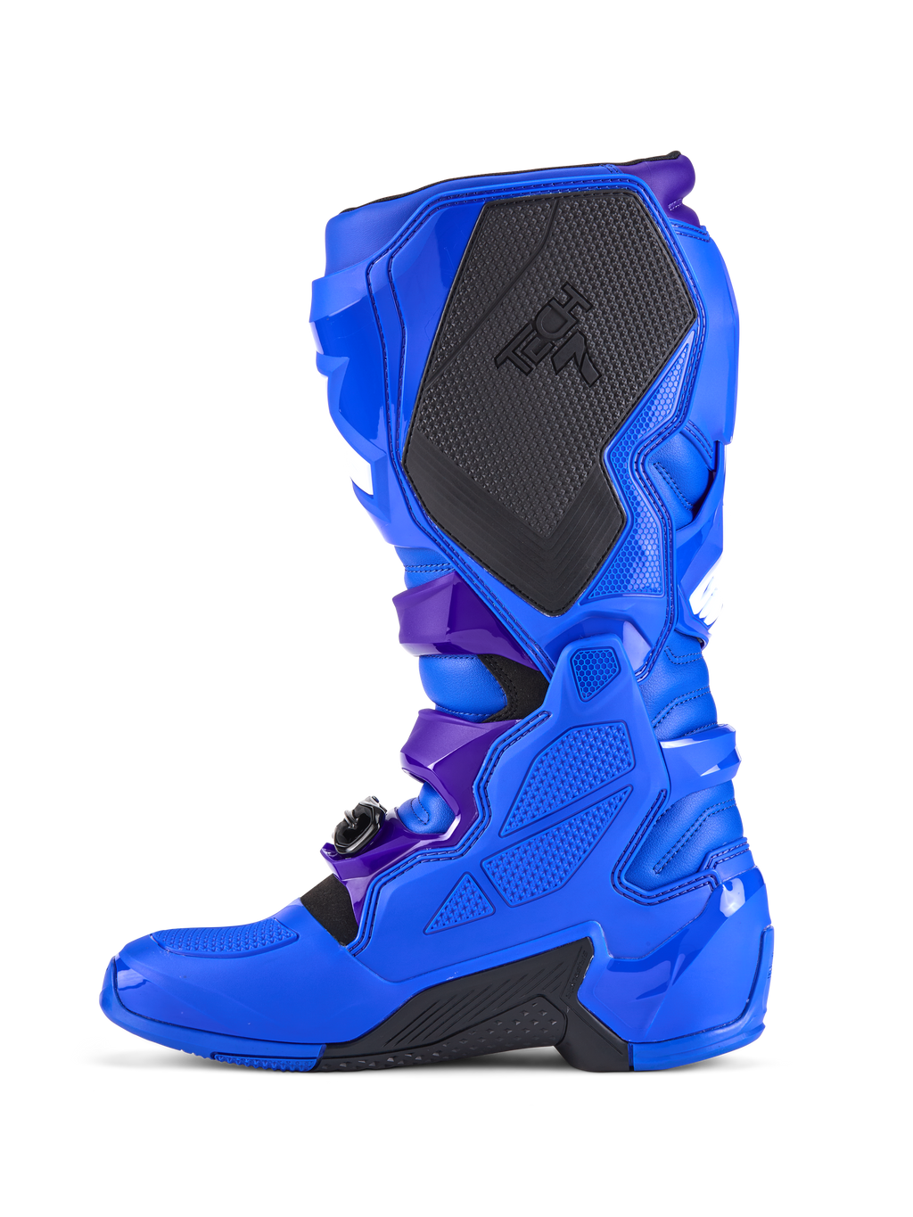 Alpinestars Tech 7 Motocross-Stiefel, Blau, Seitenansicht, mit verstärktem TPU-Schutz, großem schwarzen, strukturierten medialen Grip-Panel mit TECH 7-Branding, dunkelvioletten Riemen-Akzenten und langlebigen schwarzen Sohlenbereichen