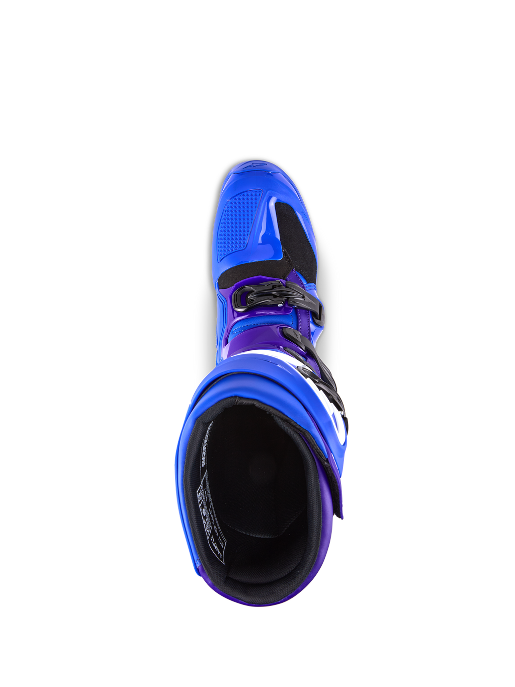 Alpinestars Tech 7 Stiefel, Motocross-Stiefel, Blau mit violetten und schwarzen Akzenten, Draufsicht mit Fokus auf das Innenfutter und das Schnallensystem, strapazierfähige TPU- und Mikrofaser-Konstruktion für Offroad-Performance