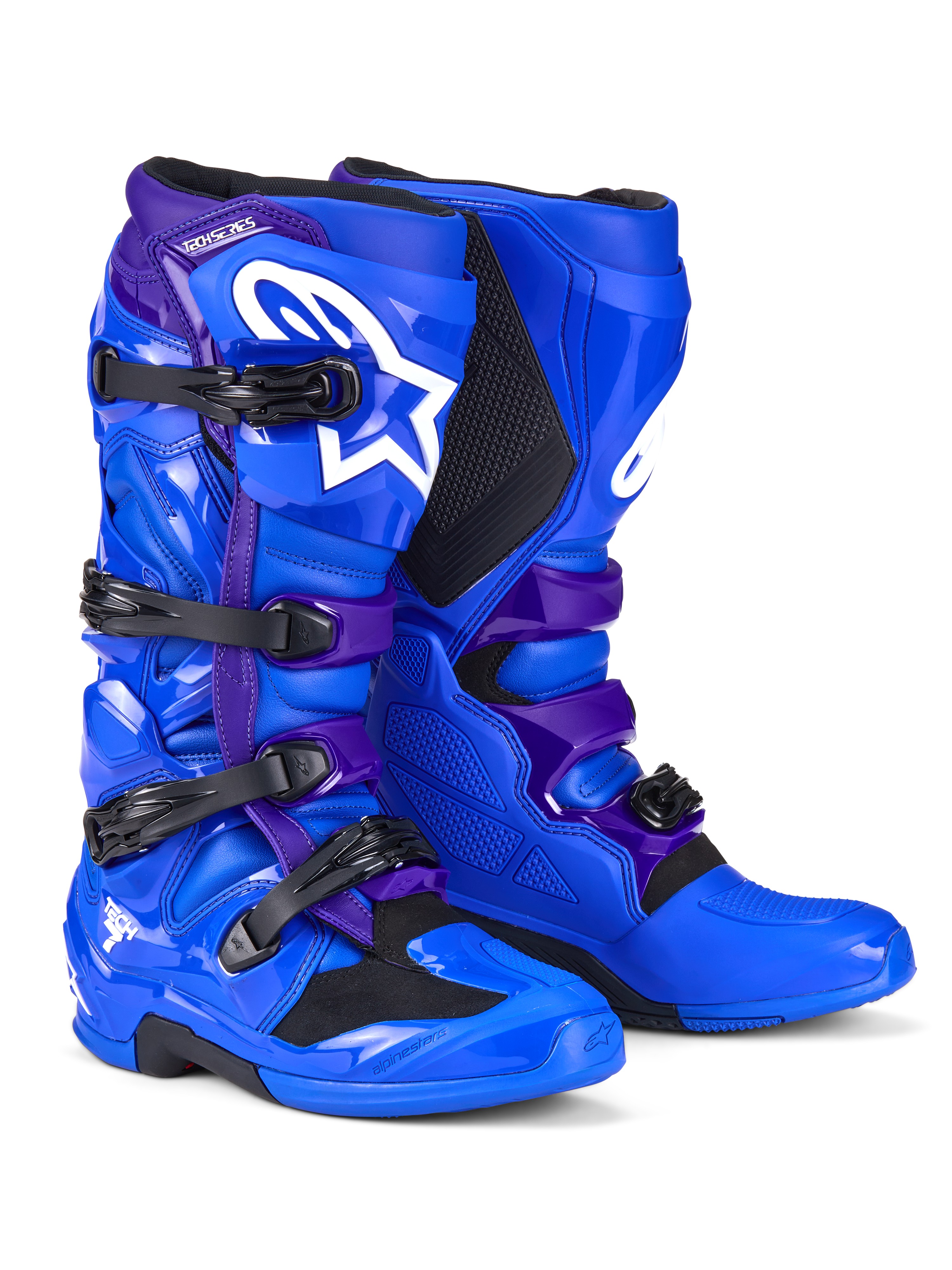 Alpinestars Tech 7 Stiefel, Motocross-Stiefel, Blau und Lila, mit weißen Alpinestars-Logos, TPU-Schutzpaneelen, Vier-Schnallen-Verschlusssystem und robustem Offroad-Sohlen-Design