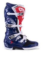 Alpinestars Tech 7 Unity Motocross Boots in red, white, and blue with protective TPU shell and buckle closure.