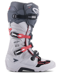 Alpinestars Tech 7 Enduro Boots, Off-Road Motorcycle Boots, Light Gray and Dark Gray with Bright Red Accents, side view featuring a multi-buckle closure system, biomechanical pivot for stability, and reinforced TPU protection panels, rugged enduro-specific sole, high-performance gear for motocross and trail riding.