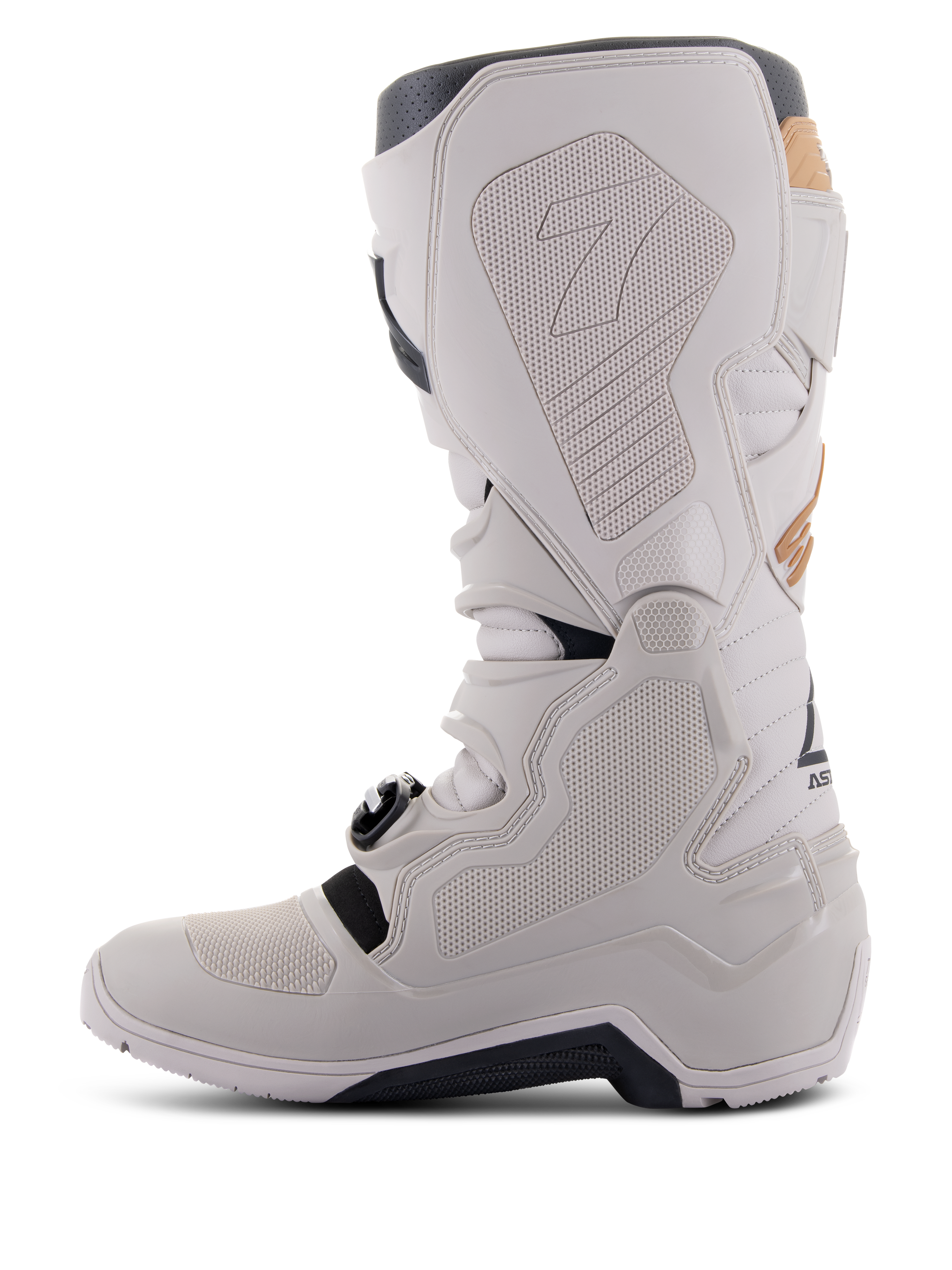 Alpinestars Tech 7 Enduro Drystar® Stiefel in Gray Sand, mediale Seitenansicht mit Grip-Panels in Wabenstruktur, hellgrauer TPU- und Mikrofaser-Konstruktion, schwarzer Außensohle und wasserdichter Membran für Offroad-Performance