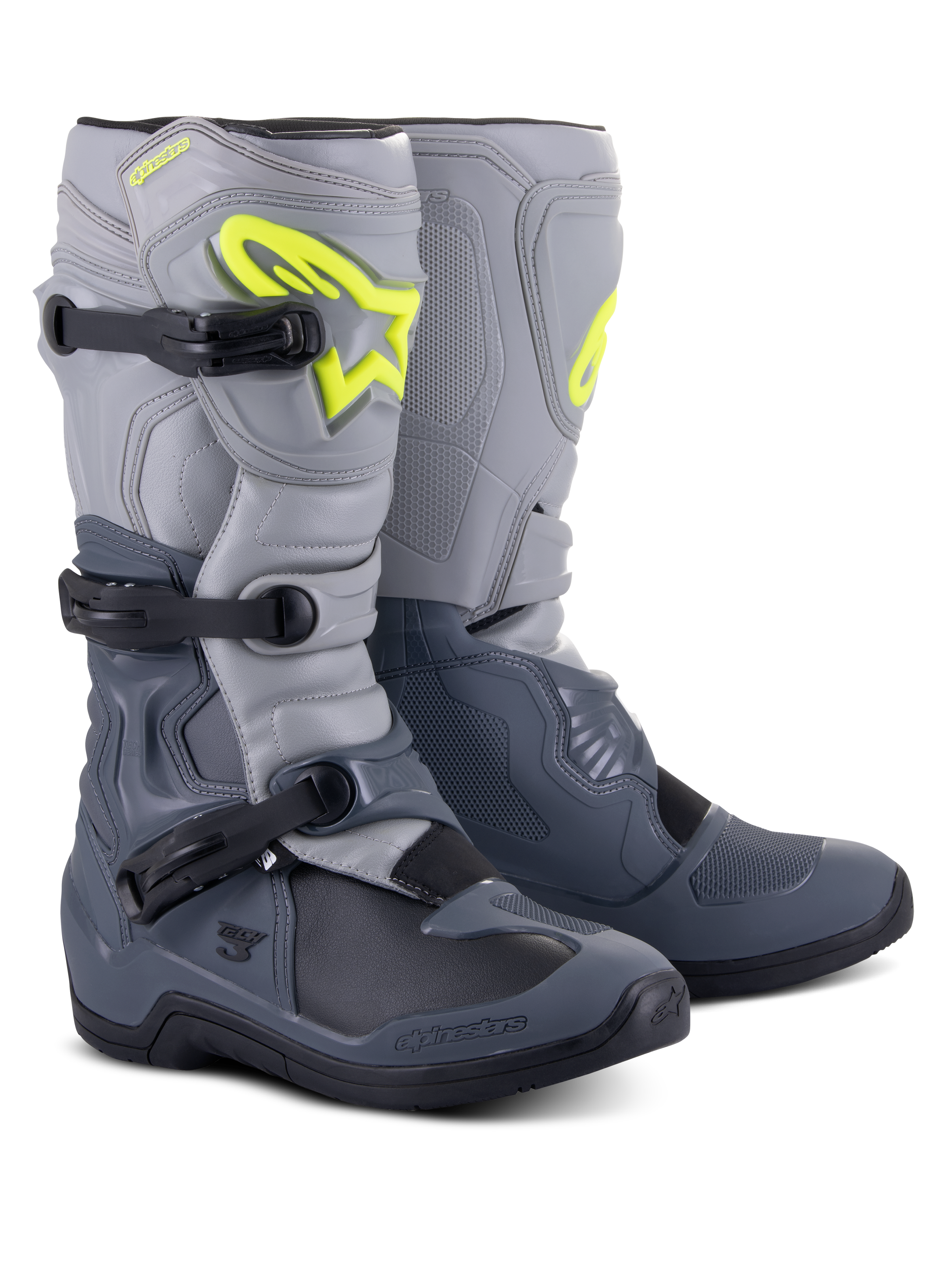 Alpinestars Tech 3 Stiefel, Motocross-Stiefel, Dunkelgrau, Hellgrau und Schwarz, mit markantem neongelbem Alpinestars-Logo, Drei-Schnallen-Verschlusssystem und verstärkten Schutzpaneelen für Offroad-Performance.