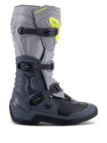 Alpinestars Tech 3 Stiefel, Motocross-Stiefel, Dunkelgrau, Hellgrau und Schwarz, Seitenansicht mit drei schwarzen Polymerschnallen, TPU-Schutzpaneelen und einem leuchtend gelben Alpinestars-Logo im oberen Schienbeinbereich