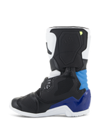 Alpinestars Kids Tech 3S Stiefel, Motocross-Stiefel, Weiß Schwarz Emaille-Blau, Seitenprofil mit schwarzen und weißen Panels sowie leuchtend blauen Akzenten an Ferse und Knöchel, weiße Sohle und strukturierte Schutzschale für den Offroad-Rennsport