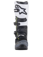 Alpinestars Tech 5 Boots, Motocross Boots, Black Dark Gray and White, front-facing view featuring a multi-buckle closure system, white upper panel with black Astars logo, dark gray reinforced toe, and subtle yellow accents