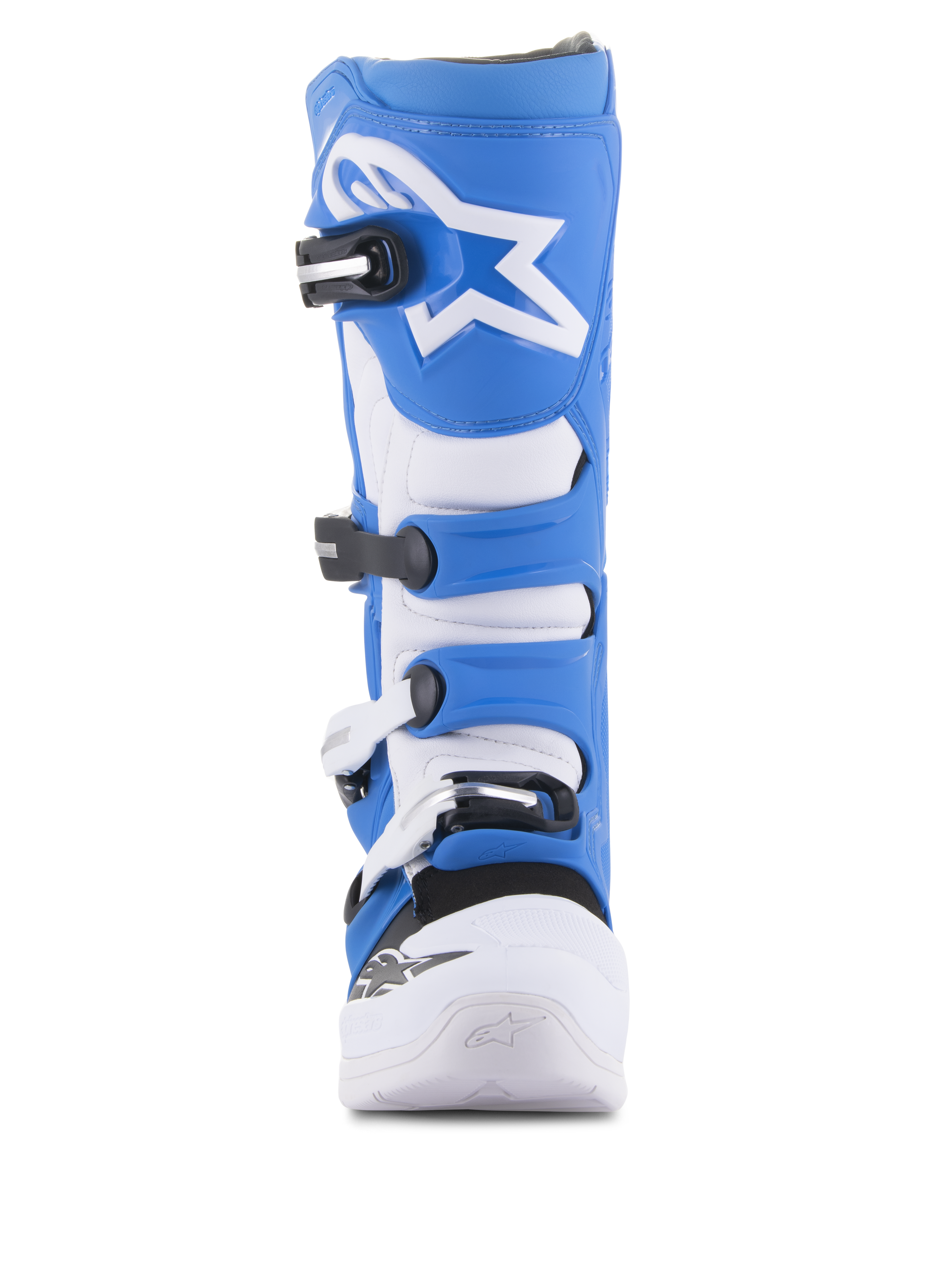 Alpinestars Tech 5 Stiefel, Motocross-Stiefel, Blau und Weiß, Vorderansicht, mit Vier-Schnallen-Verschlusssystem, weißem Alpinestars Stern-Logo auf der blauen Schienbeinplatte und strapazierfähigem Mikrofaser-Chassis mit verstärktem weißem Zehenbereich.