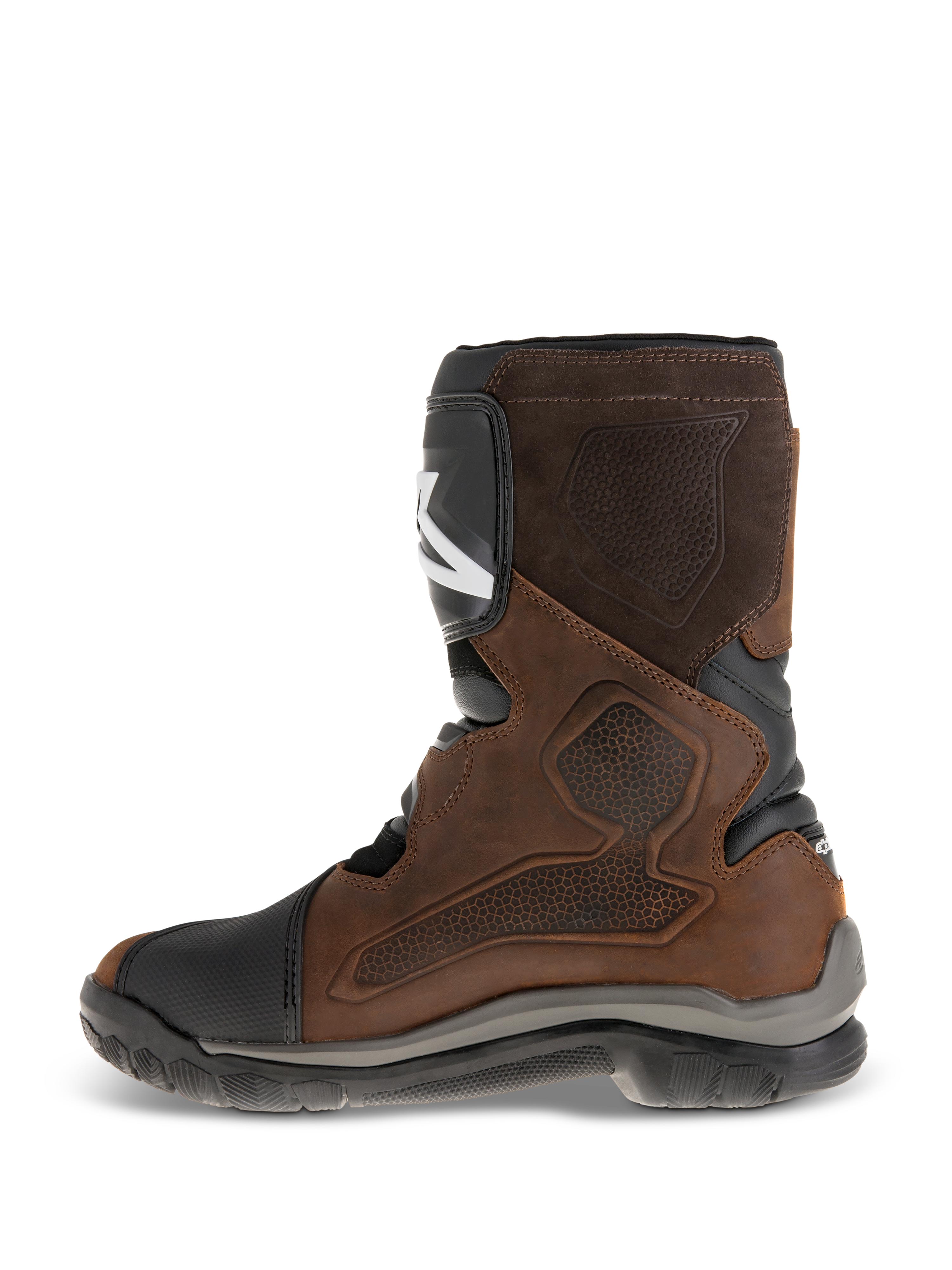 Alpinestars Belize Drystar® Boots, short-calf adventure touring motorcycle boots, oiled brown leather with black and grey accents, showing the medial side with a large heat-press textured grip panel, TPU shin plate, and rugged vulcanized rubber sole