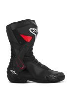 Alpinestars SMX-6 V3 Drystar Boots, motorcycle sport riding boots, black with red and white accents, side profile view, waterproof microfiber construction, TPU lateral ankle brace with red detailing, white logos on the shin and heel, integrated toe slider and mesh flex zones