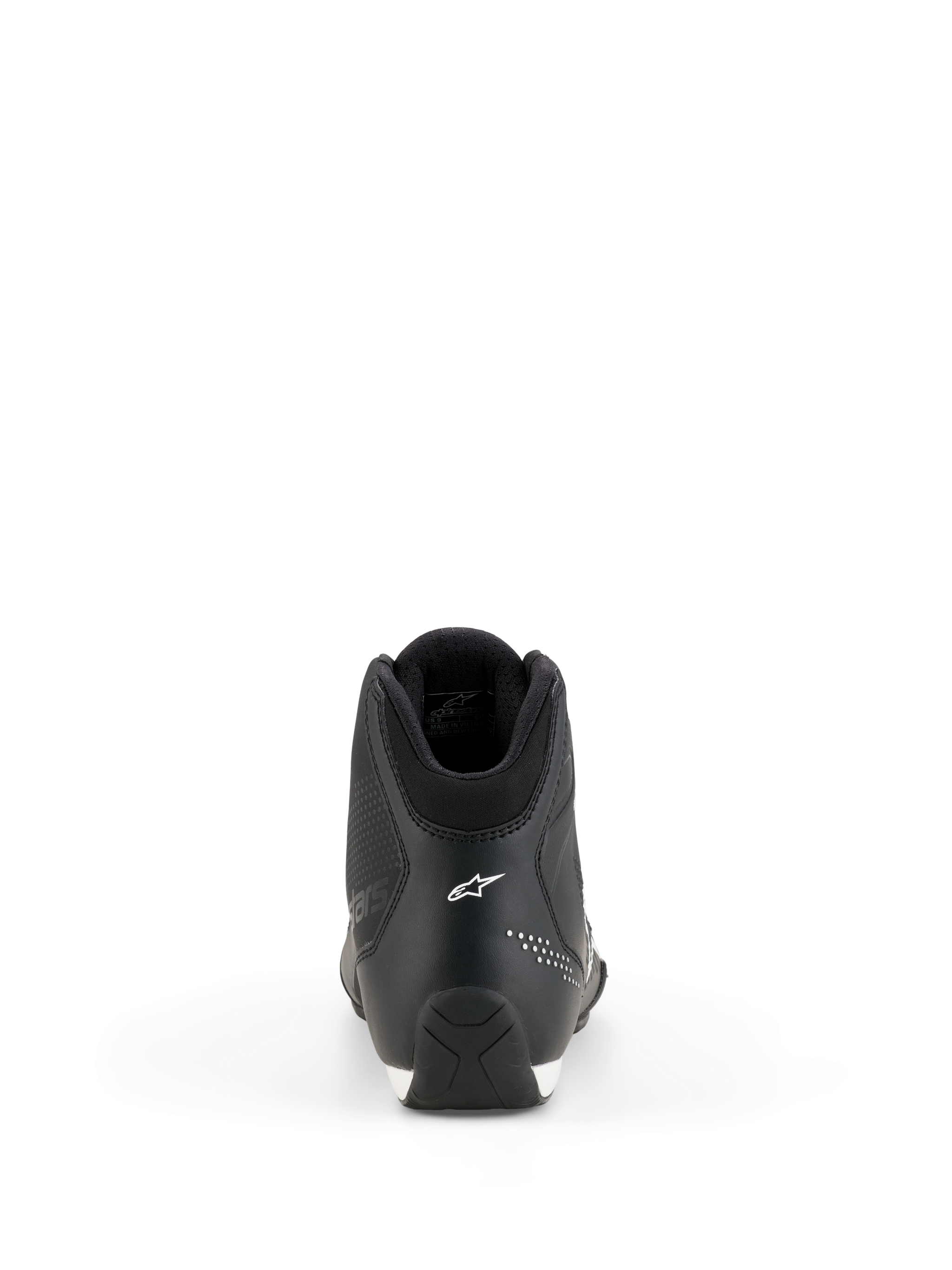 Alpinestars Celer Shoes, Motorcycle Riding Shoes, Black and White, rear view showing the heel construction, white Alpinestars star logo, micro-perforated details, and textured rubber sole for sport performance riding