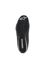 Alpinestars Celer Shoes, Motorcycle Riding Shoes, Black White, underside view of the oil-resistant rubber sole featuring a textured grip pattern and white Alpinestars branding.