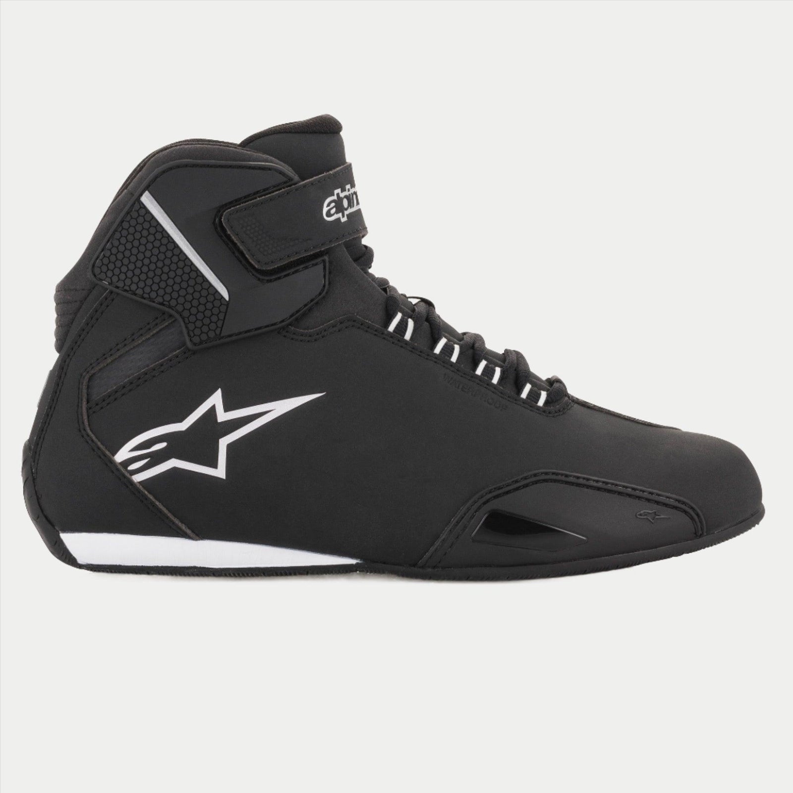 Alpinestars Women Stella Sektor Waterproof Shoes, Motorcycle Riding Shoes, Black and Silver, side profile view featuring a black microfiber chassis, white Astars logo, silver reflective accents, and a speed lace system with an ankle strap.