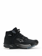Alpinestars CR-X Women's Drystar Riding Shoes, Black high-top motorcycle sneakers, side view of women's urban riding footwear with lace-up closure and Velcro ankle strap, white Alpinestars star logo, 'Drystar' and 'TPF' branding on the midsole, rugged rubber sole with white and gray patterns.