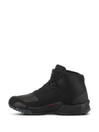 Alpinestars CR-X Drystar Motorradschuhe, Motorradschuhe, Schwarz, Seitenprofilansicht, High-Top-Design mit Laufschuh-Silhouette, mit verstärkter TPU-Schaltzone, profilierter Außensohle für Grip und wasserdichter Konstruktion für Stadt- und Straßenfahrten.