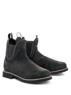 Alpinestars Turnstone Schuhe, schwarze Motorradstiefel im Chelsea-Stil, Obermaterial aus mattem Rindsleder mit elastischen Seiteneinsätzen und hinteren Zuglaschen, urbane Motorradschuhe mit robuster Profilsohle und weißer Rahmennaht