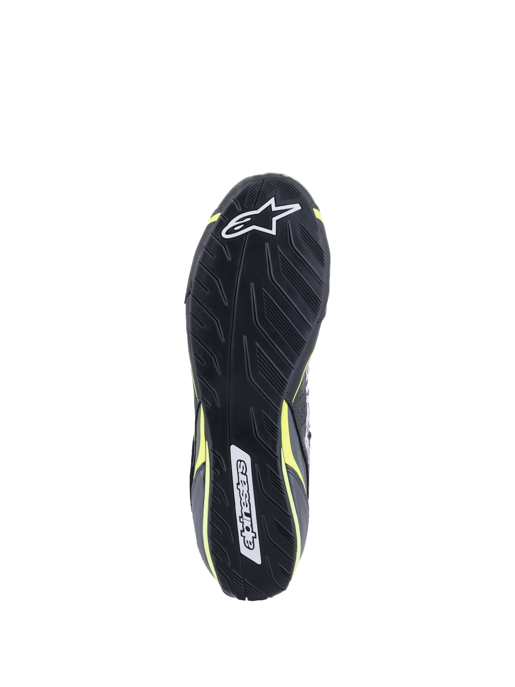 Alpinestars Tech-1 T V3 Schuhe FIA, Ansicht der Außensohle, Schwarz mit gelb fluoreszierenden Akzenten, asymmetrische Gummisohle mit Reifenprofil-Inspiration, mit Alpinestars-Logos und strukturierter Oberfläche für Pedalsensibilität und Grip.