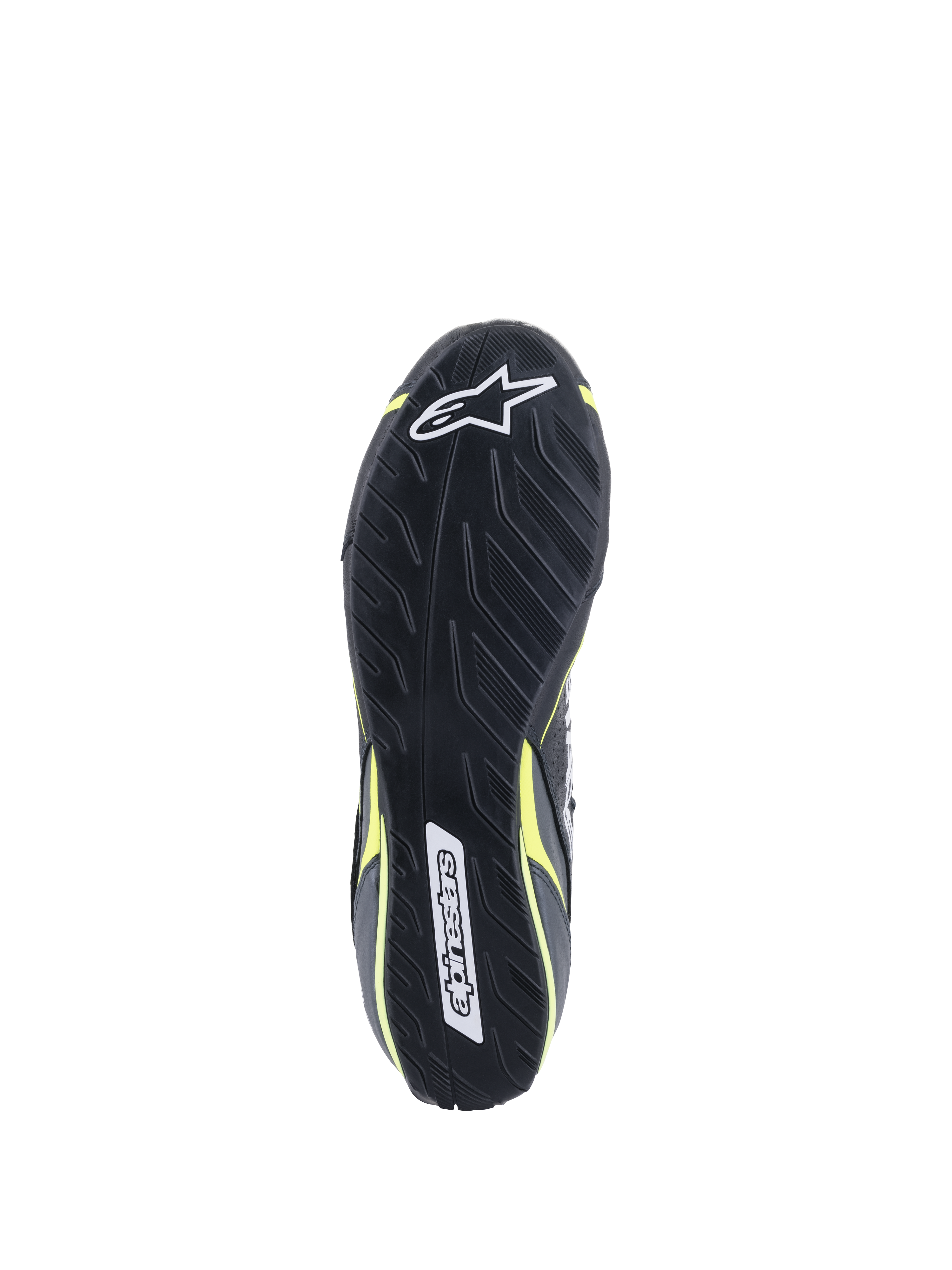 Alpinestars Tech-1 T V3 Schuhe FIA, Ansicht der Außensohle, Schwarz mit gelb fluoreszierenden Akzenten, asymmetrische Gummisohle mit Reifenprofil-Inspiration, mit Alpinestars-Logos und strukturierter Oberfläche für Pedalsensibilität und Grip.