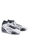 Alpinestars Tech-1 T V3 Shoes FIA, White and Black Racing Shoes, professional motorsport footwear, FIA certified, high-top leather design with perforated ventilation, hook and loop ankle strap, and bold black Astars branding.