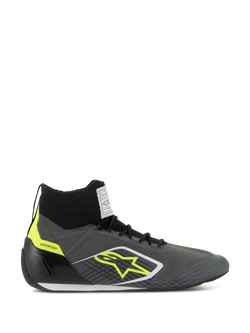 Alpinestars Supertech Schuhe FIA/SFI, professionelle hochgeschnittene Rennschuhe, Cool Gray und Schwarz mit neongelben Akzenten, mit gestricktem Obermaterial aus Aramid, Fersenkappe aus Carbon, gelbem Stern-Logo und dünner weiß-schwarzer Sohle, motorsportzertifiziertes Schuhwerk