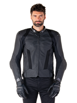 Alpinestars Missile V3 Airflow Leather Jacket, Black, Motorcycle Racing Jacket, worn by a model with black gloves and pants, featuring perforated leather panels, mesh ventilation, and external shoulder protectors, premium leather construction for sport riding.