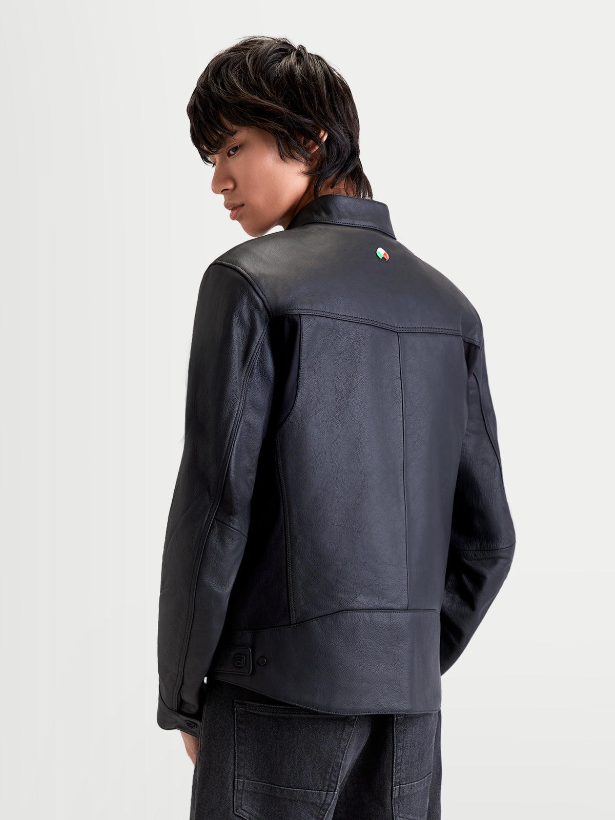 Alpinestars Maver-X Leather Jacket, men's urban contemporary motorcycle jacket in black, rear view on a model showing premium leather construction and biker-style collar