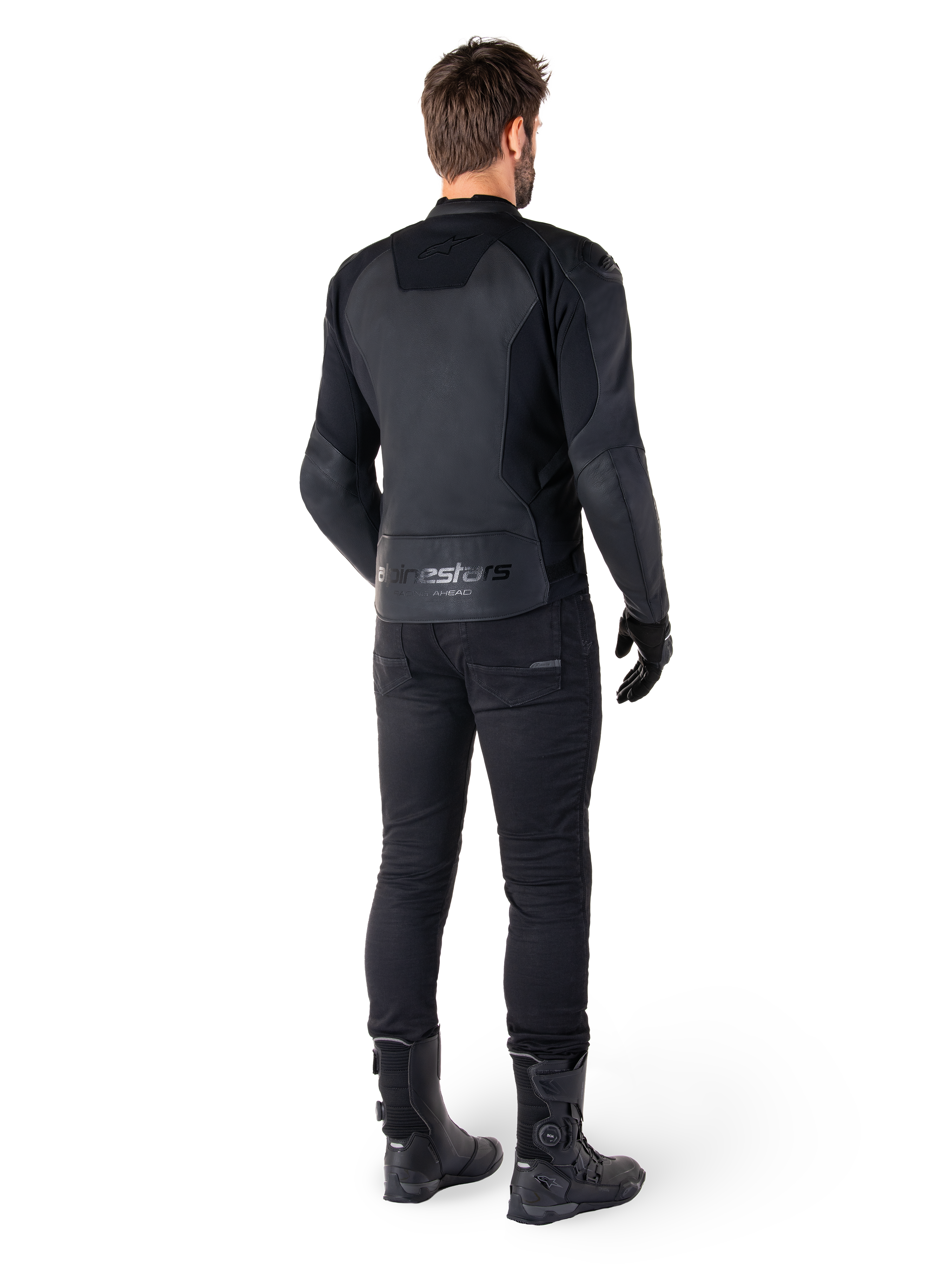 Alpinestars Faster V3 Leather Jacket, Black Black, rear view on a rider, featuring premium leather panels and embossed Alpinestars branding, paired with black riding pants and boots for a complete sport motorcycling look.