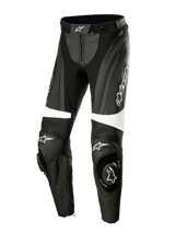 Alpinestars Stella Missile V3 Lederhose, Damen-Motorrad-Rennhose, Schwarz und Weiß, mit Akkordeon-Stretchpaneelen über den Knien, integrierten Knieschleifern mit Alpinestars-Logo, weißen Akzentbändern und einer stromlinienförmigen Passform für Sport- und Rennstreckeneinsätze.