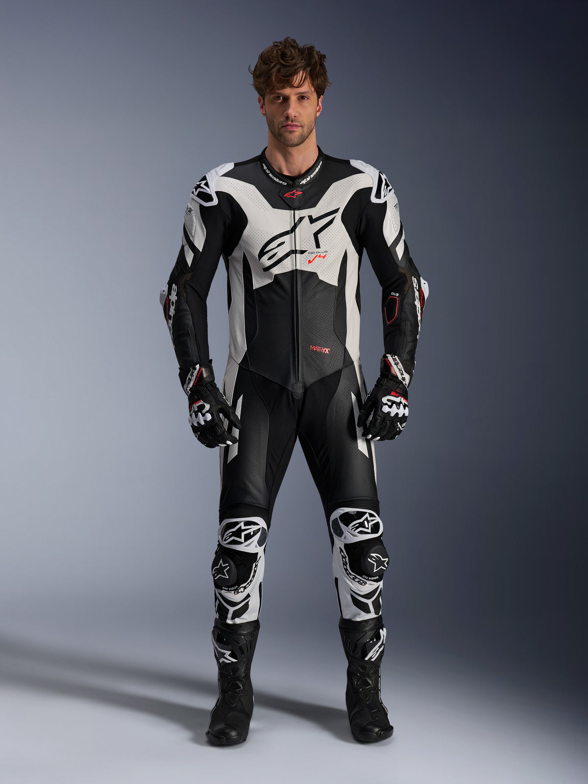 Alpinestars GP Plus V4 Sprint 1-Teilige Lederkombi, Motorrad-Rennausrüstung für Herren, Schwarz, Weiß und Fluo-Rot.