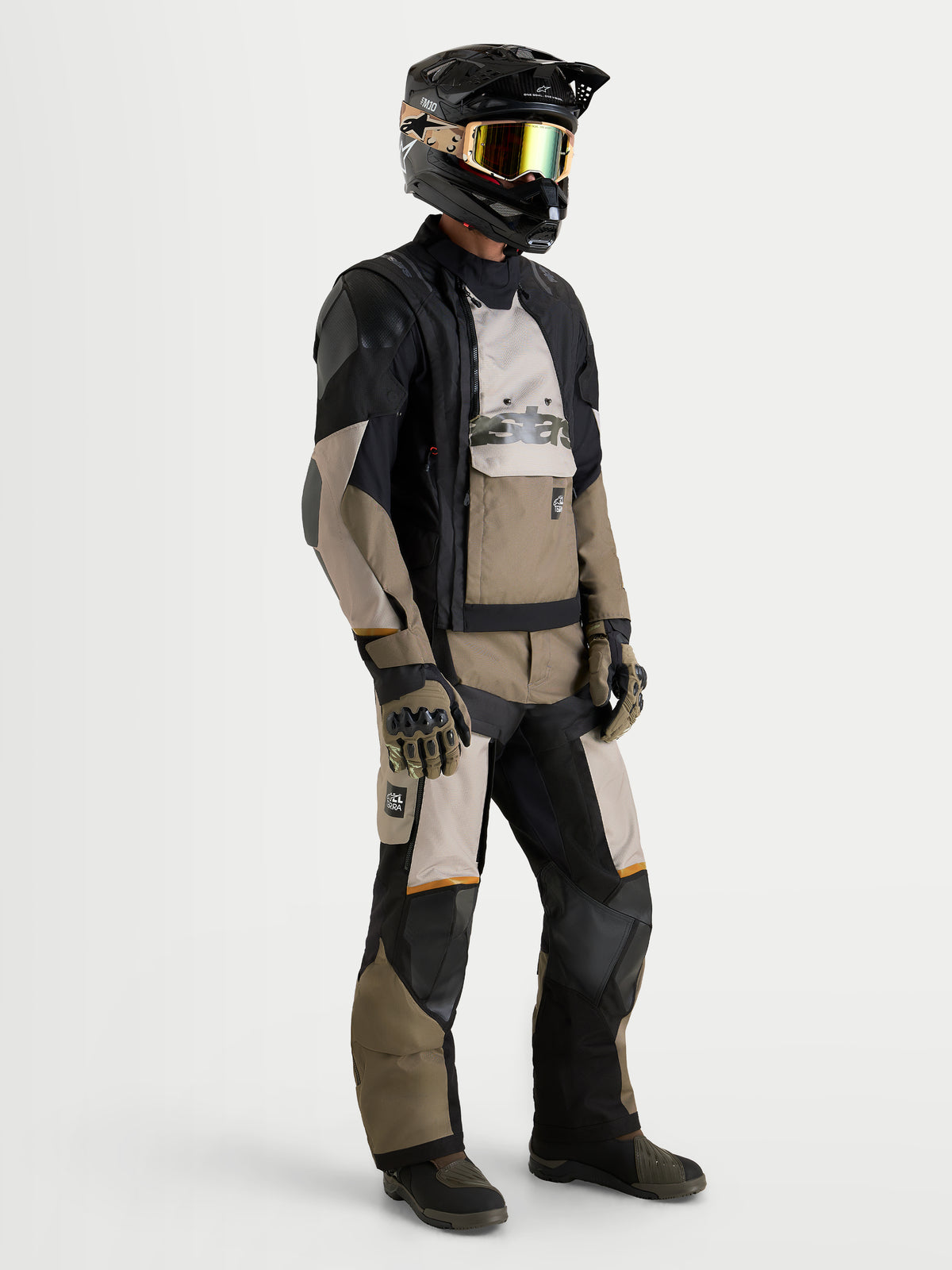 Alpinestars Harok V2 Drystar Jacket, Men's Aluminum, Walnut, and Black all-terrain adventure motorcycle textile jacket, worn by a rider with a matching helmet and matching pants