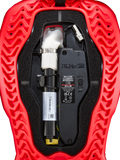 Alpinestars Tech-Air® 5 Plasma Airbag Ersatzkartusche, Airbag-System-Zubehör, Rot und Schwarz, Nahaufnahme der Innenansicht mit weißer Argon-Kartusche und silberner Klemme, elektronischer Steuereinheit mit ON/OFF-Schalter und wellenförmig gerippter roter Außenschale