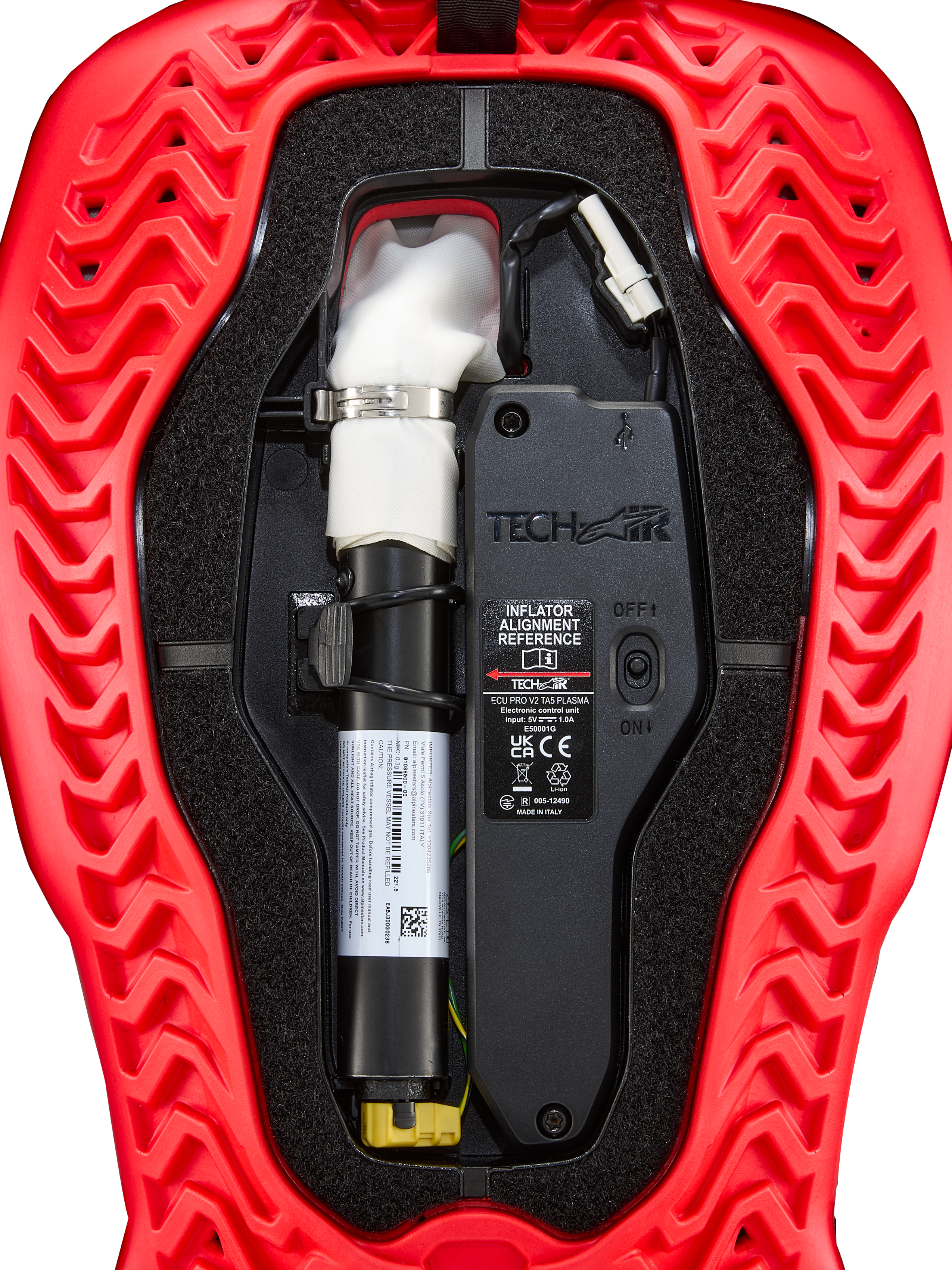 Alpinestars Tech-Air® 5 Plasma Airbag-Ersatzkartusche mit schwarzer ECU und weißem Inflator in roter Schale, Rot und Schwarz.