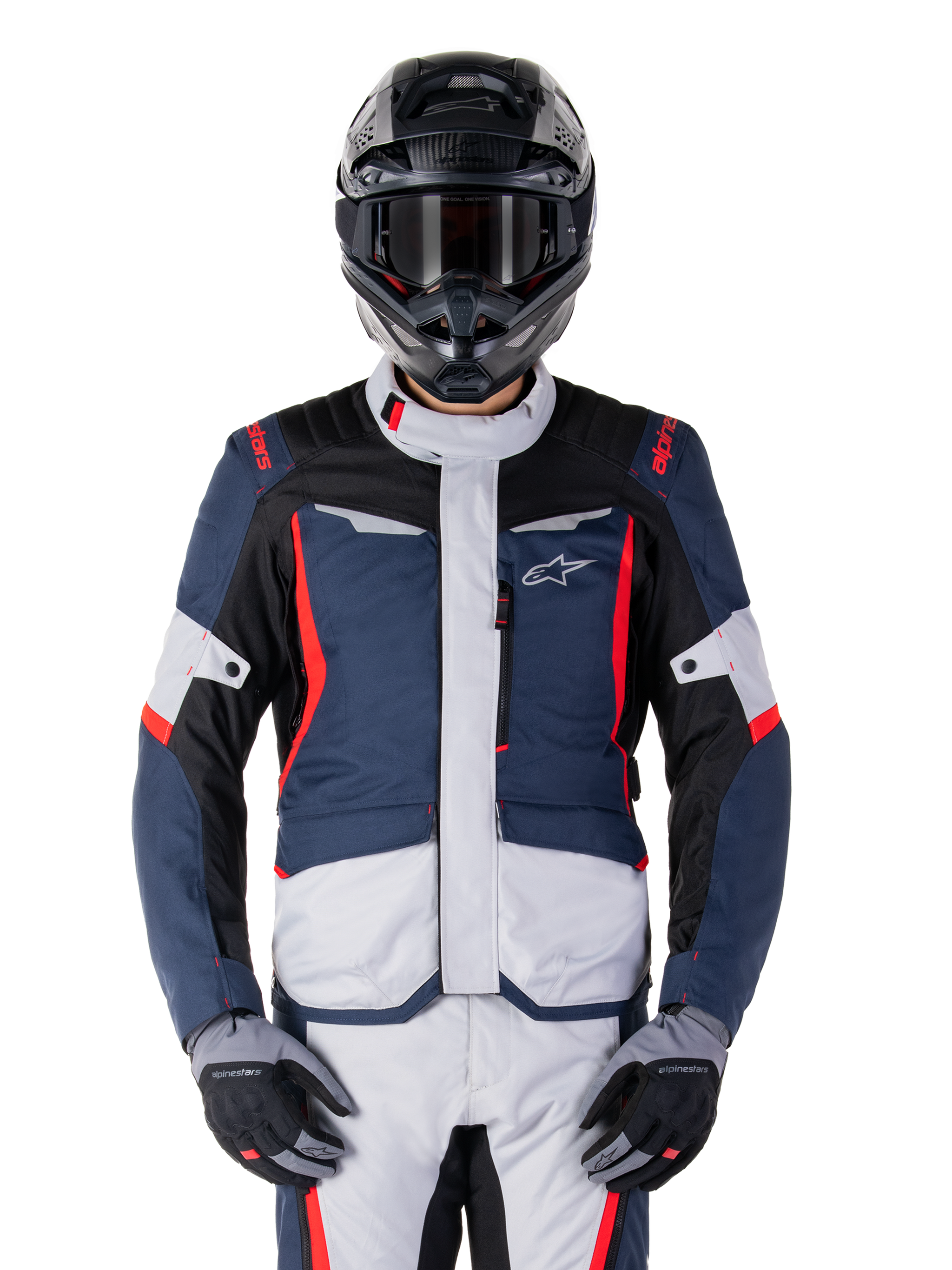 Alpinestars ST-1 Waterproof Jacket, Adventure Touring Jacket, Dark Blue Black and Bright Red, worn with a black adventure helmet and grey gloves, featuring light grey panels and red accents on shoulders and zippers, sleek design with Alpinestars branding on chest, durable waterproof gear for motorcycle riding