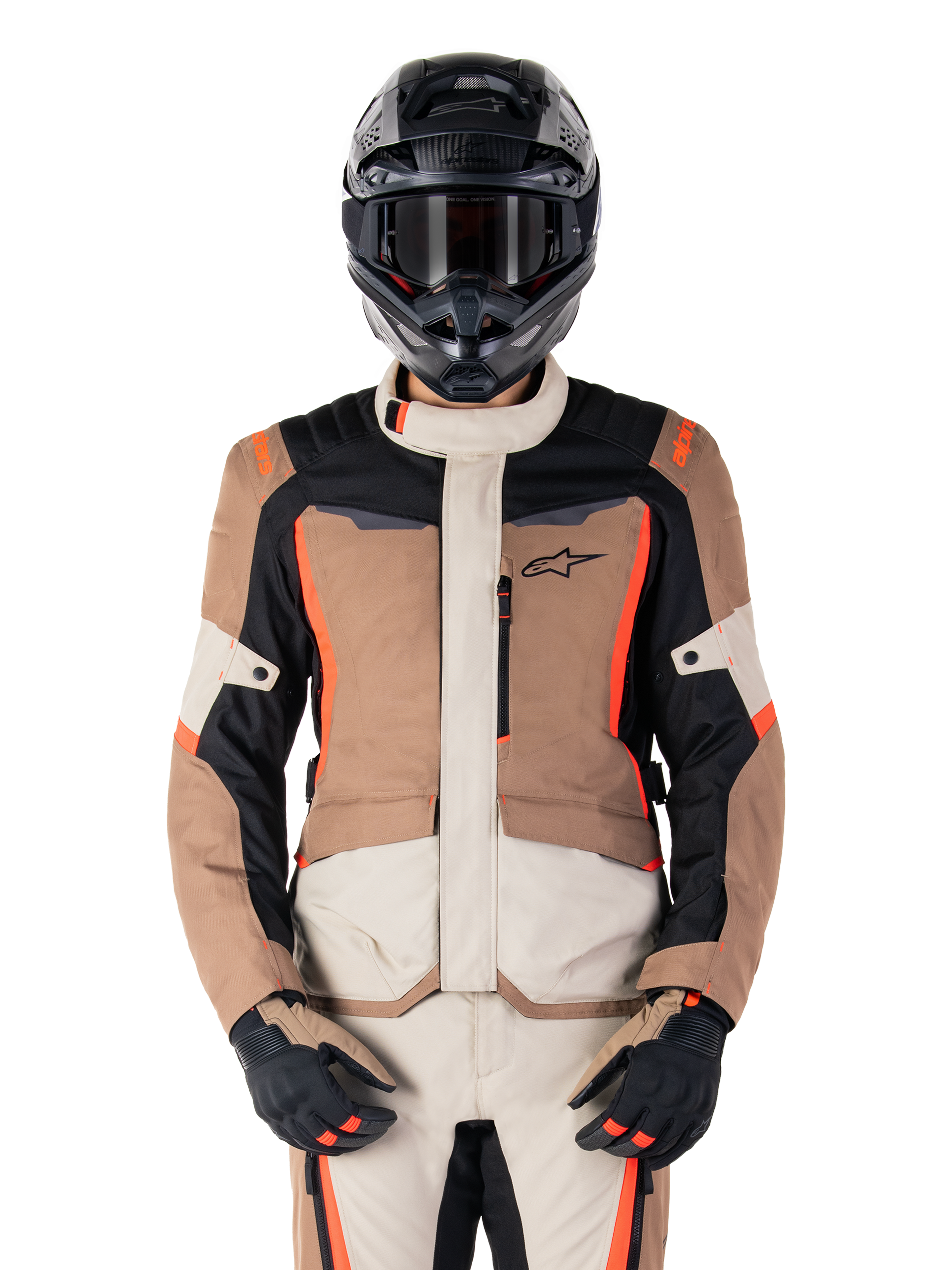 Alpinestars ST-1 Waterproof Jacket, Adventure Touring Jacket, Dark Khaki and Sand with Black and Red Fluo accents, worn with matching pants, black adventure helmet and gloves, waterproof protective gear for all-weather riding