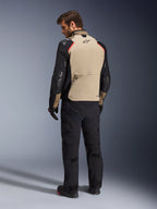 Alpinestars Andes Pro Drystar® XF Jacket, Motorcycle Jacket, Walnut and Black with red accents, back view on model, adventure touring design with large rear storage pocket, worn with black riding pants and gloves.