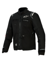Alpinestars Cusco Drystar® Jacket, Black motorcycle jacket for adventure touring, features technical textile construction with multiple ventilation zippers, white Alpinestars logo on chest and shoulders, All Terra branding, and reflective details