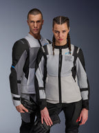 Alpinestars ST-2 Air Jackets, Textile Motorcycle Jackets, Ice Gray Dark Gray Black, couple wearing matching adventure touring gear with mesh ventilation panels and Alpinestars Exploration Equipment branding, holding motorcycle gloves