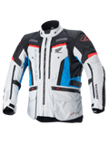 Alpinestars Honda Bogota' Pro Drystar® Jacket, Motorcycle Touring Jacket, Ice Gray Blue and Bright Red, technical textile design with multiple zippers and pockets, adjustable straps on waist and arms, featuring Alpinestars and Honda logos, waterproof and breathable all-season touring protection.