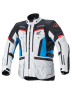Alpinestars Honda Bogota' Pro Drystar® Jacket, Motorcycle Touring Jacket, Ice Gray Blue and Bright Red, technical textile design with multiple zippers and pockets, adjustable straps on waist and arms, featuring Alpinestars and Honda logos, waterproof and breathable all-season touring protection.
