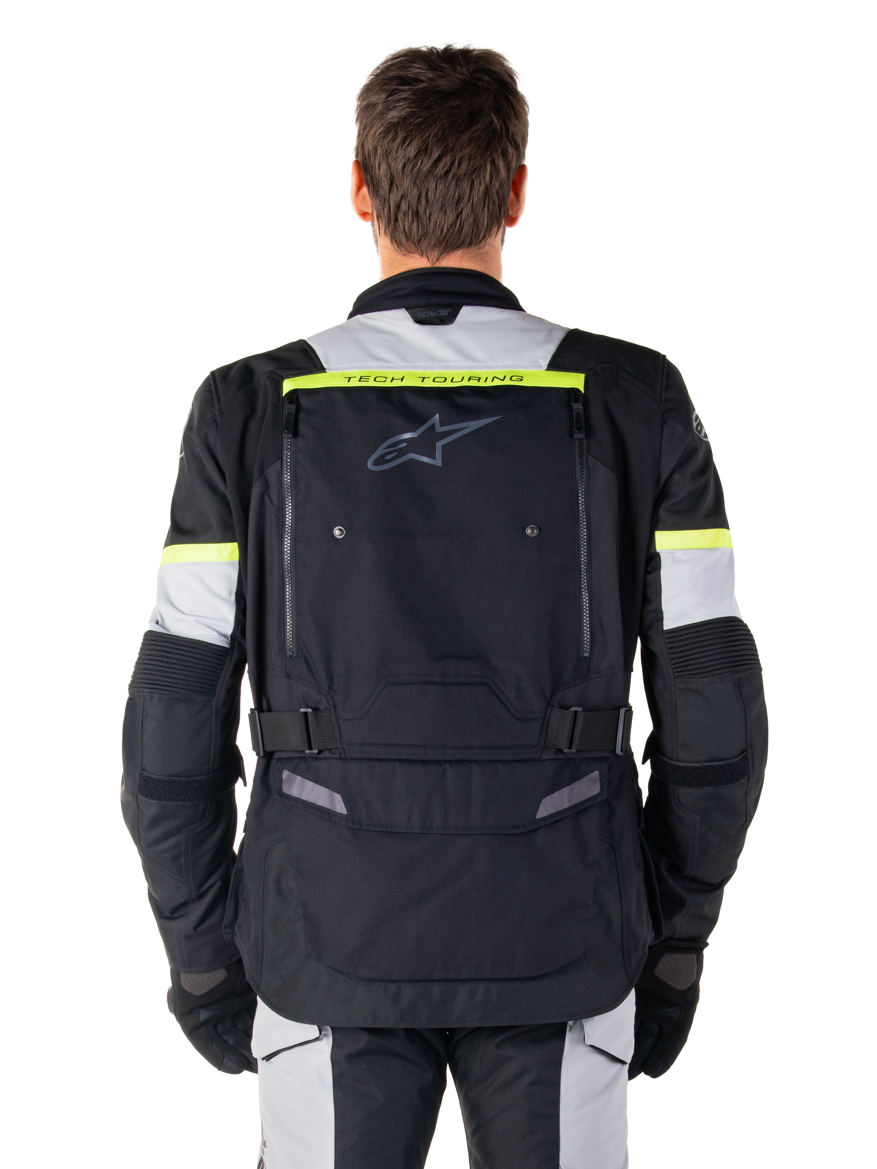 Alpinestars Bogota' Pro Drystar® Jacket, Adventure Touring Motorcycle Jacket, Black Ice Gray and Yellow Fluo, rear view showing 'TECH TOURING' branding on a fluorescent yellow stripe, large back ventilation panel, and adjustable waist straps, technical all-season gear