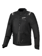 Alpinestars Stella Andes V4 Drystar® Jacke, Damen-Motorradjacke, Schwarz, Vorderansicht mit weißen Logos auf der Brust und den Schultern, Multi-Panel-Textildesign mit Reißverschlüssen und reflektierenden Details, Adventure-Touring-Stil