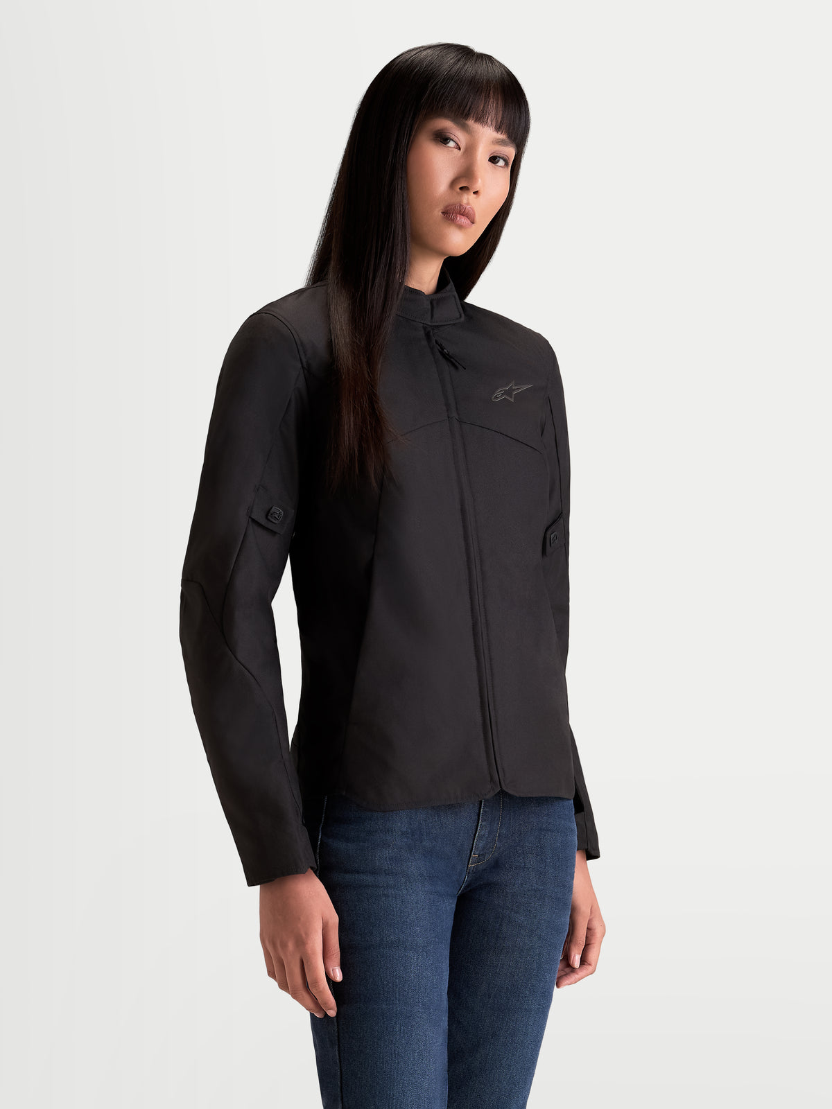 Alpinestars Stella C 1 Waterproof Jacke, Damen-Motorradjacke in Schwarz, Vorderansicht an einem Model mit Textilkonstruktion und ergonomischem Kragen